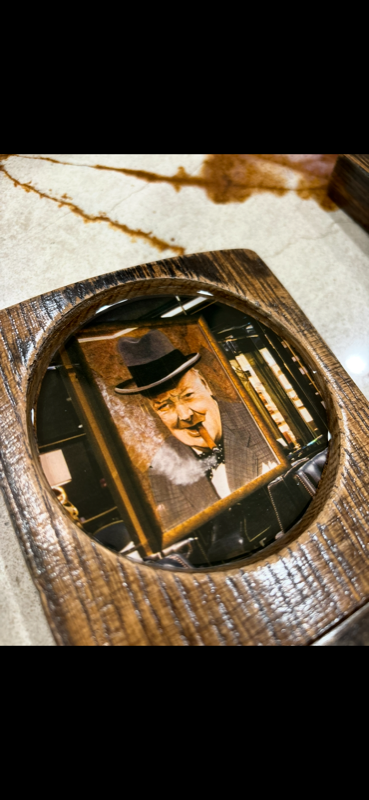 Handcrafted barrel-wood coaster with vintage Winston Churchill portrait medallion